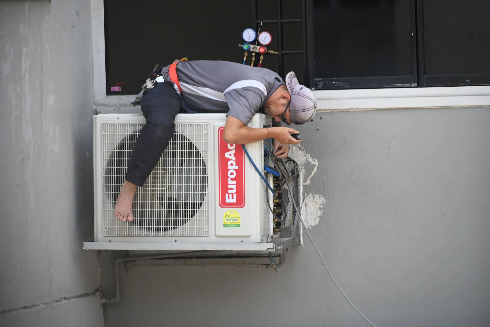 Air movers and a commercial dehumidifier drying a wet floor